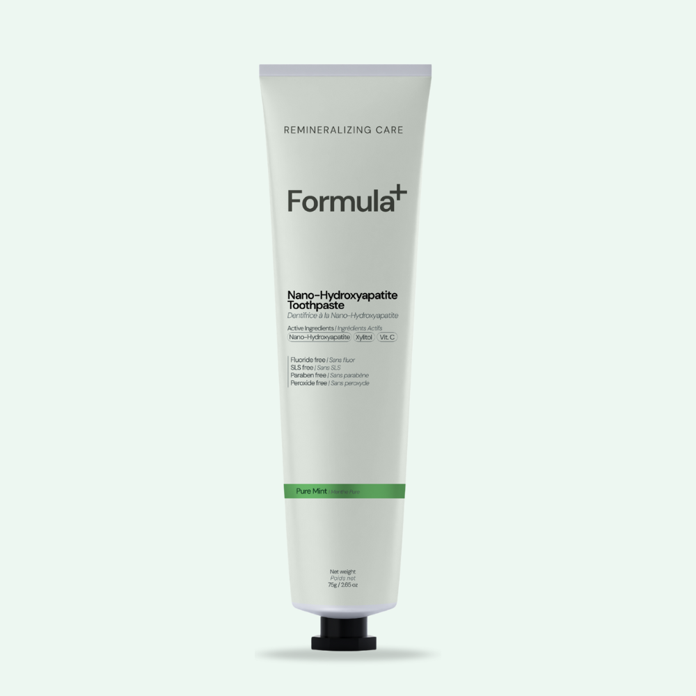 Tube of Formula+ toothpaste on a white background